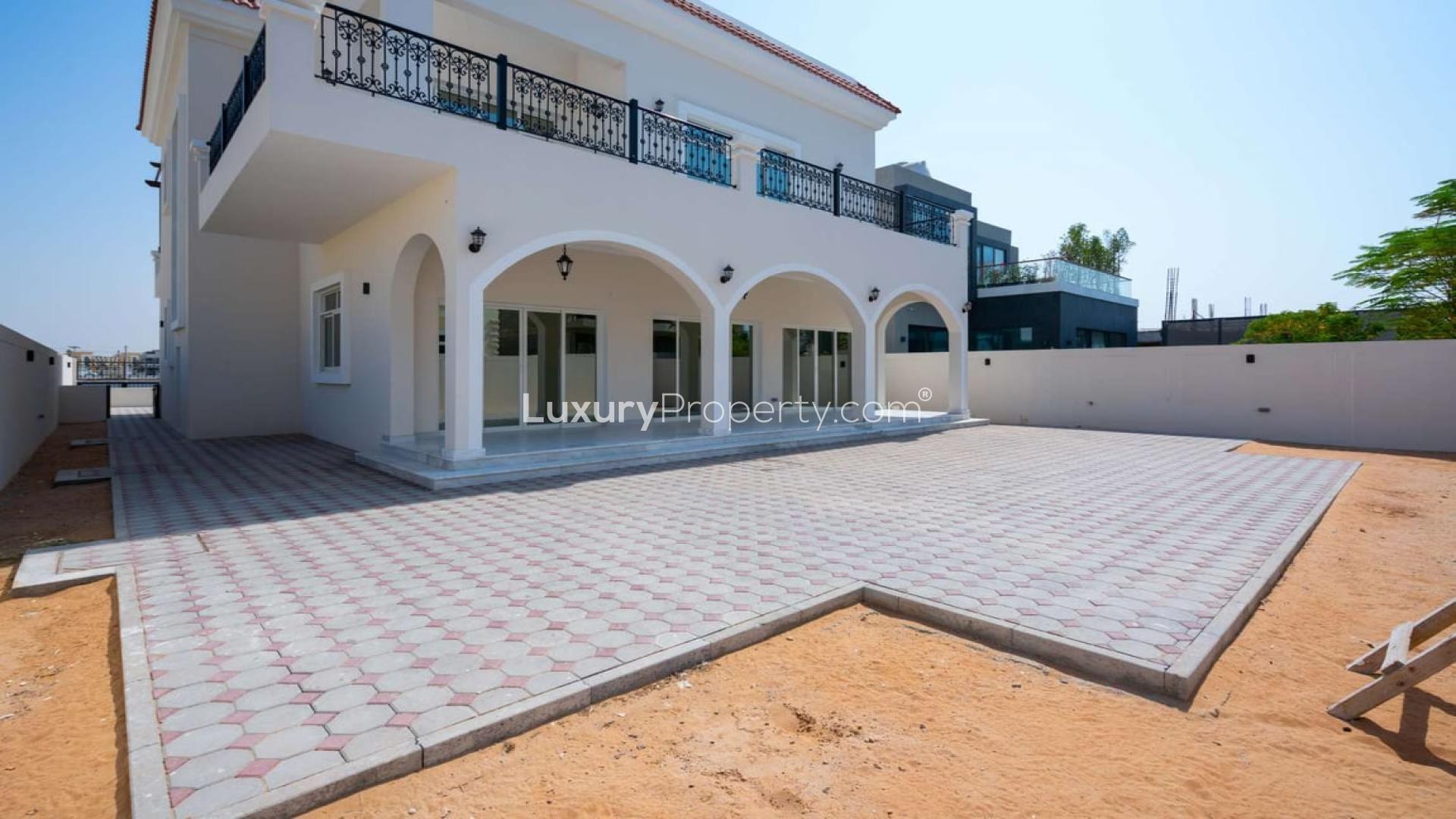 Custom-built 4-bedroom villa exterior in Jumeirah Park, Legacy, modern finishes, for rent