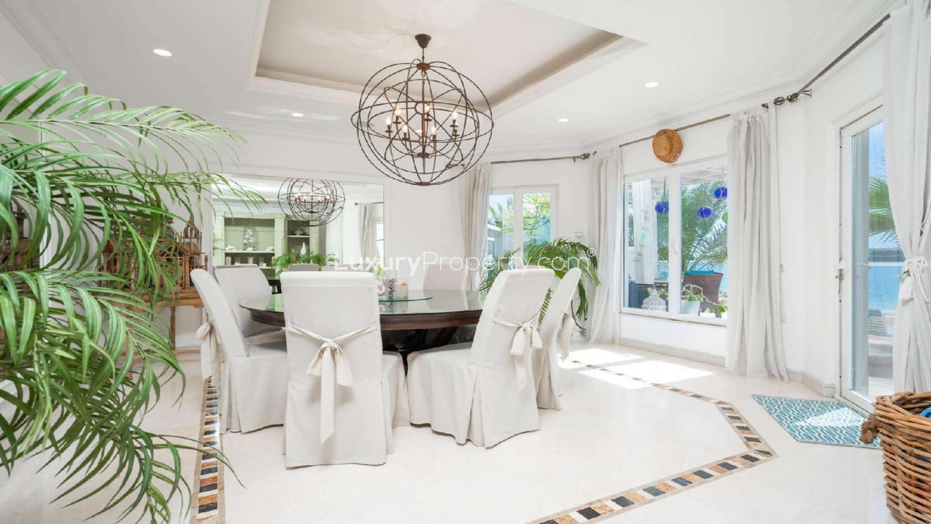 Luxurious living room in upgraded Mediterranean-style villa, Palm Jumeirah, with sea view windows