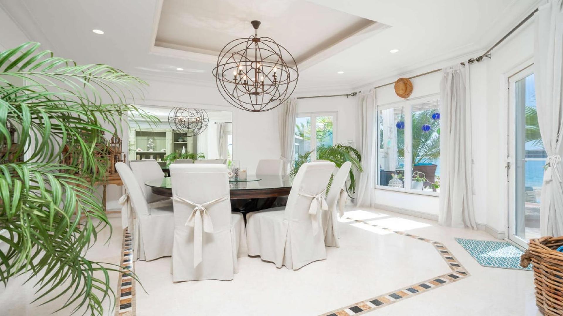 Luxurious living room in upgraded Mediterranean-style villa, Palm Jumeirah, with sea view windows