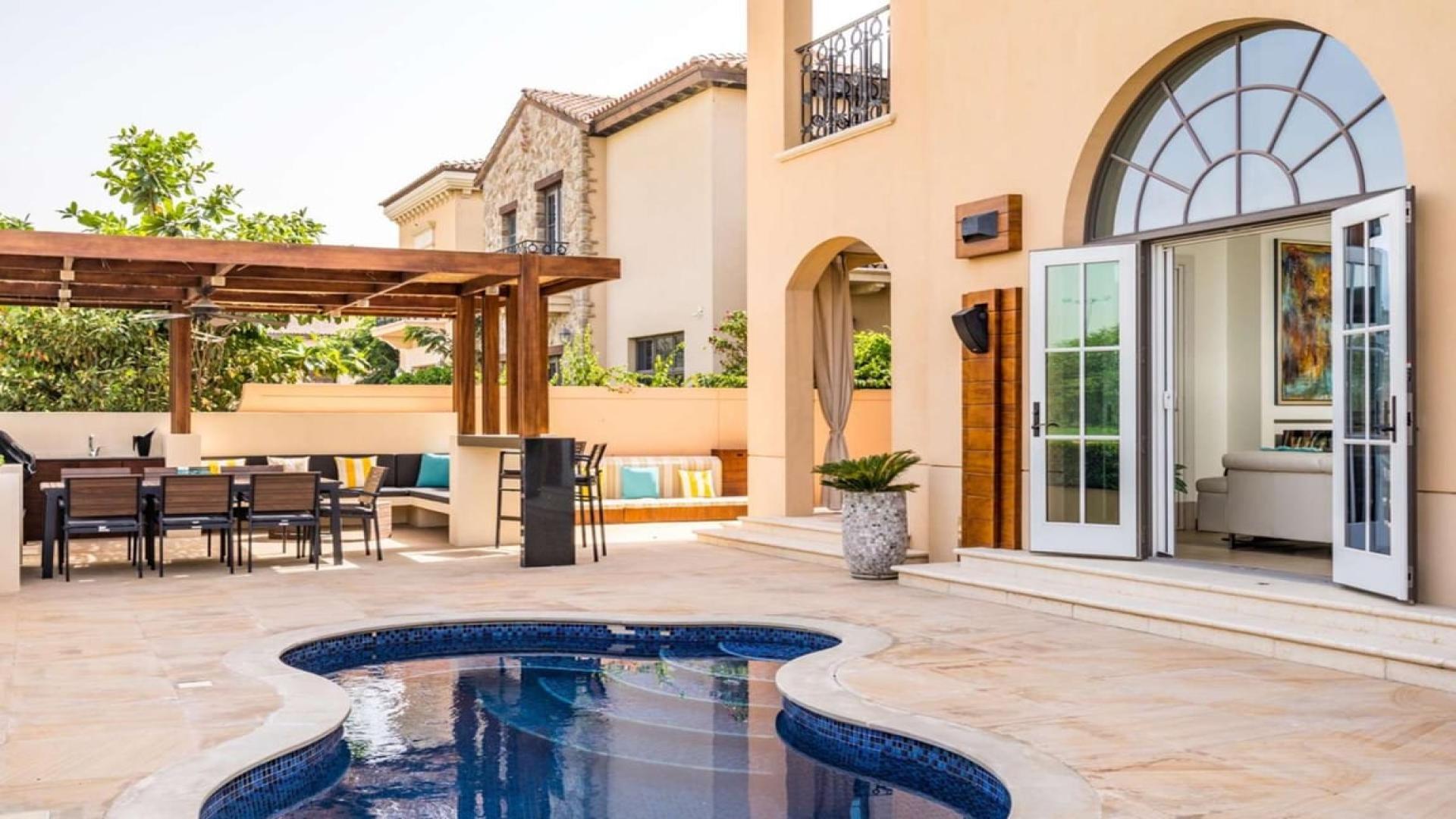 Modern kitchen in Firestone-style villa at Whispering Pines, Jumeirah Golf Estates, available for rent