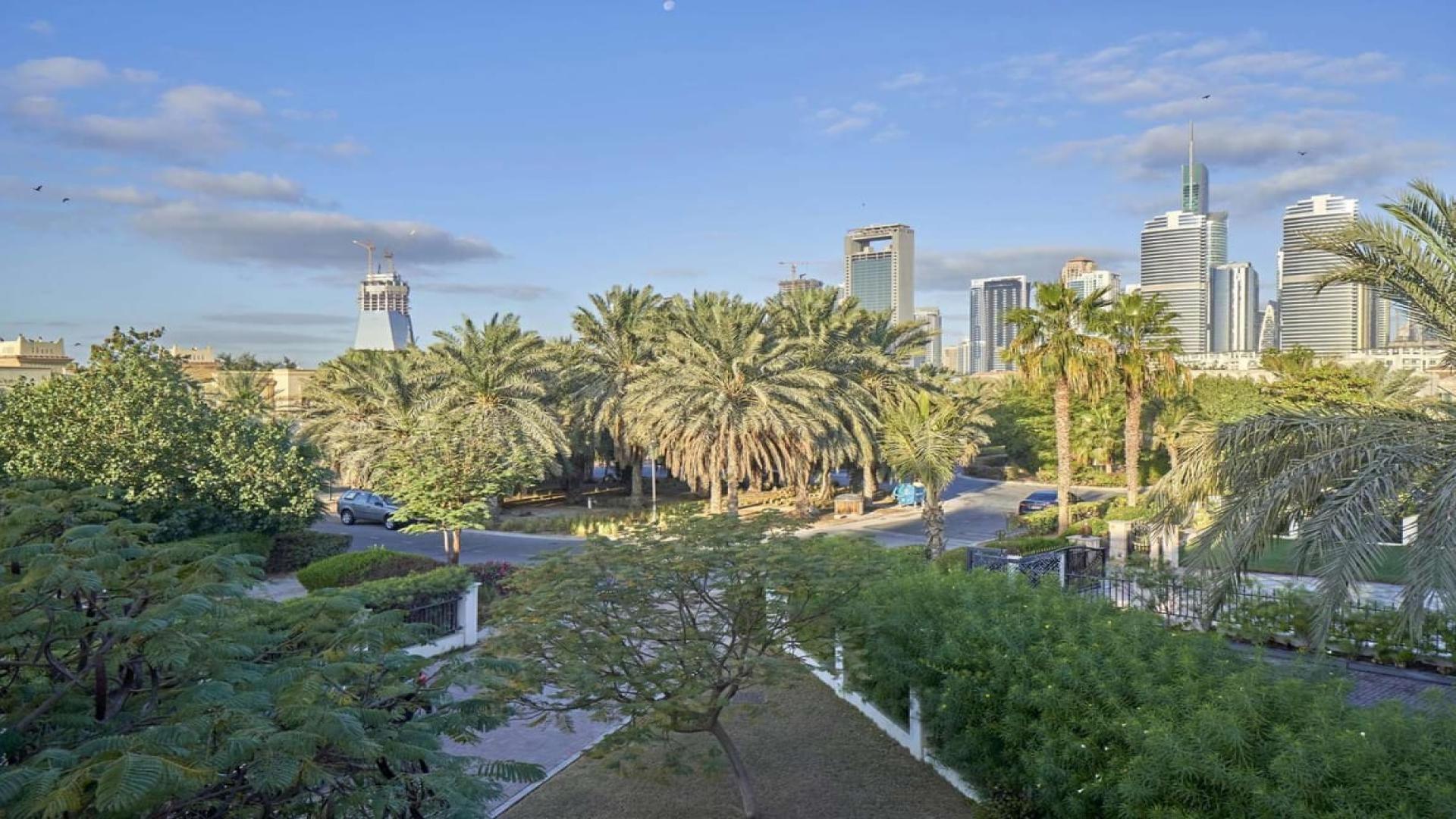 Elegant villa interior with high ceilings and large windows in Jumeirah Islands, European Clusters