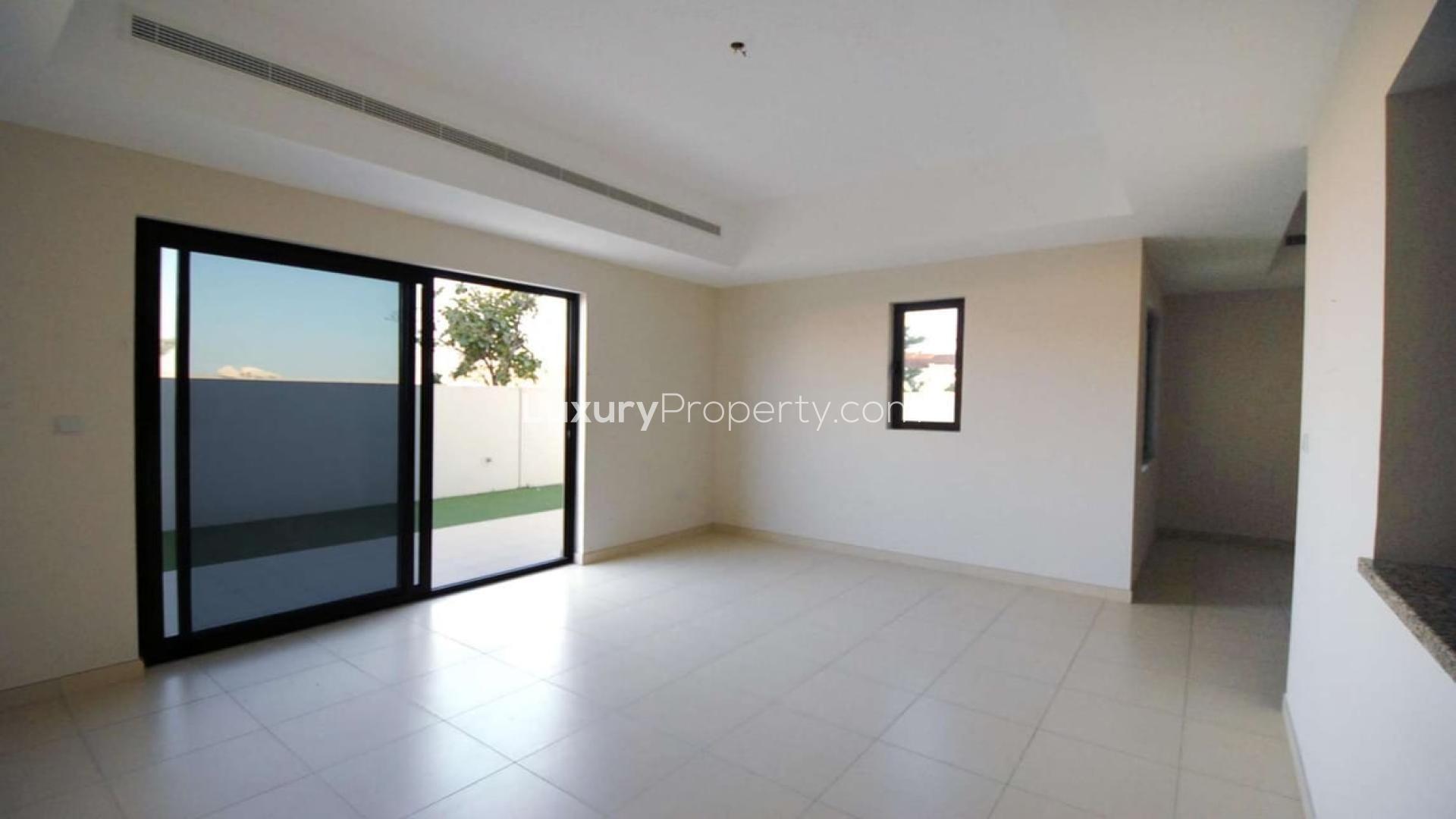 Elegant 4-bedroom villa interior in Mira 2, Reem, featuring spacious living area and staircase