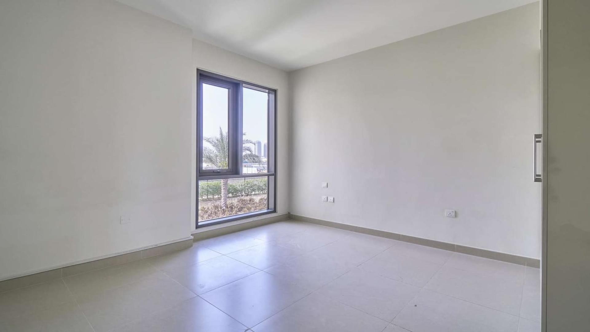 Empty room with large window in Maple 1 townhouse, Dubai Hills Estate
