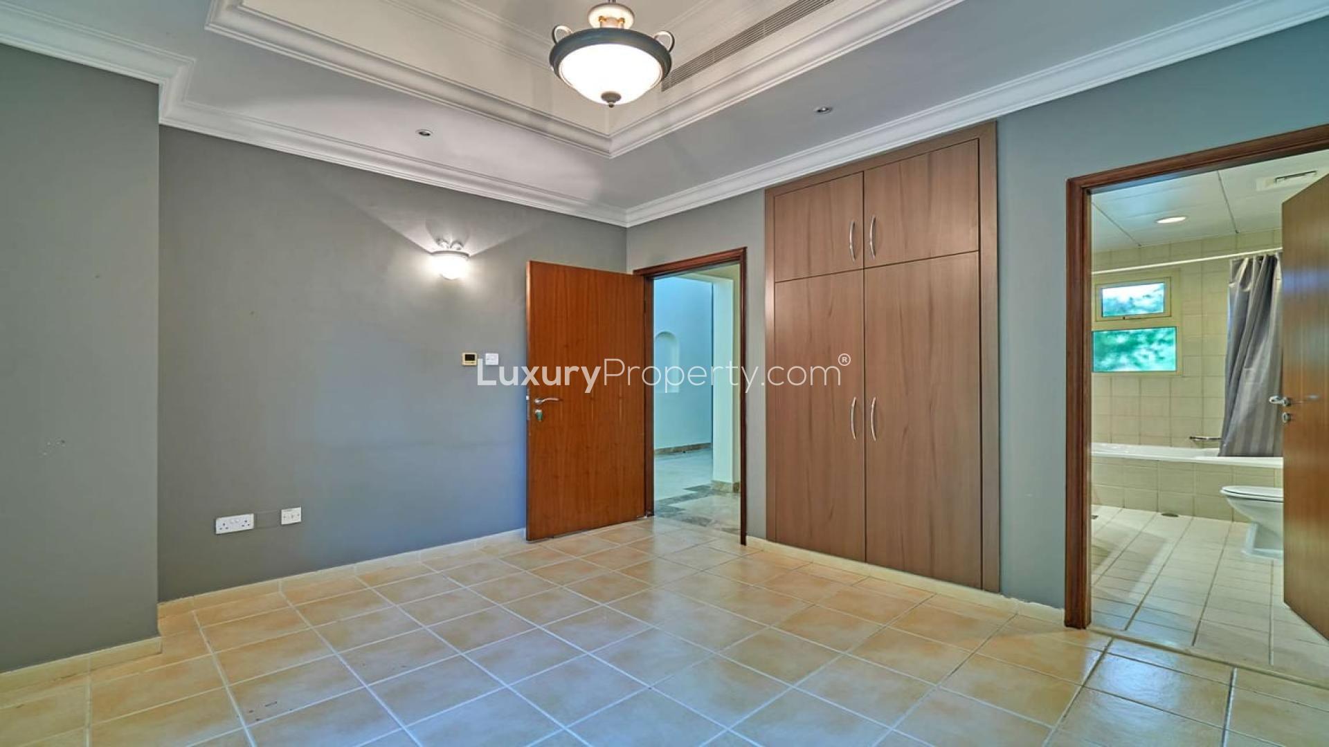 Spacious interior of luxury villa in Jumeirah Islands, featuring elegant marble flooring