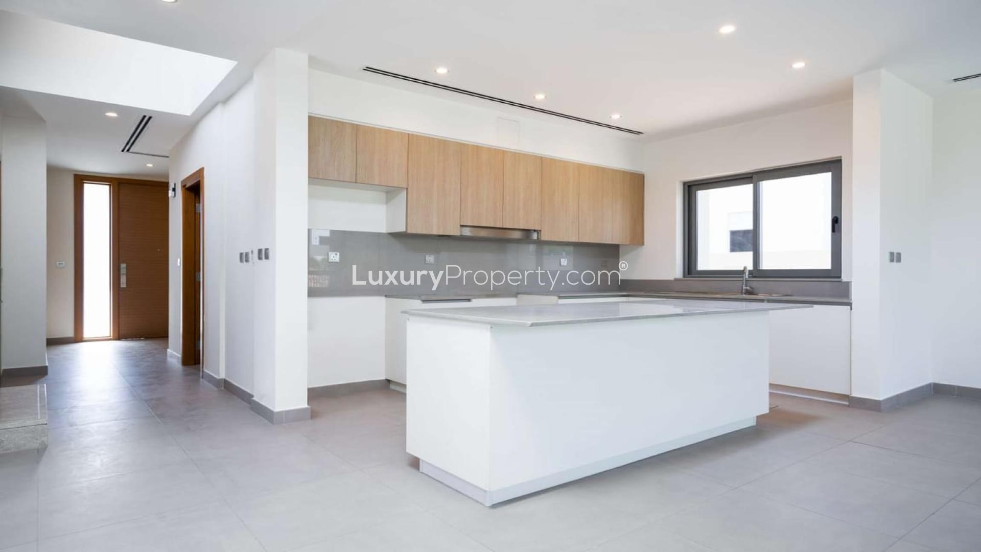 Modern four-bedroom villa exterior with garden in Dubai Hills Estate, Sidra Villas