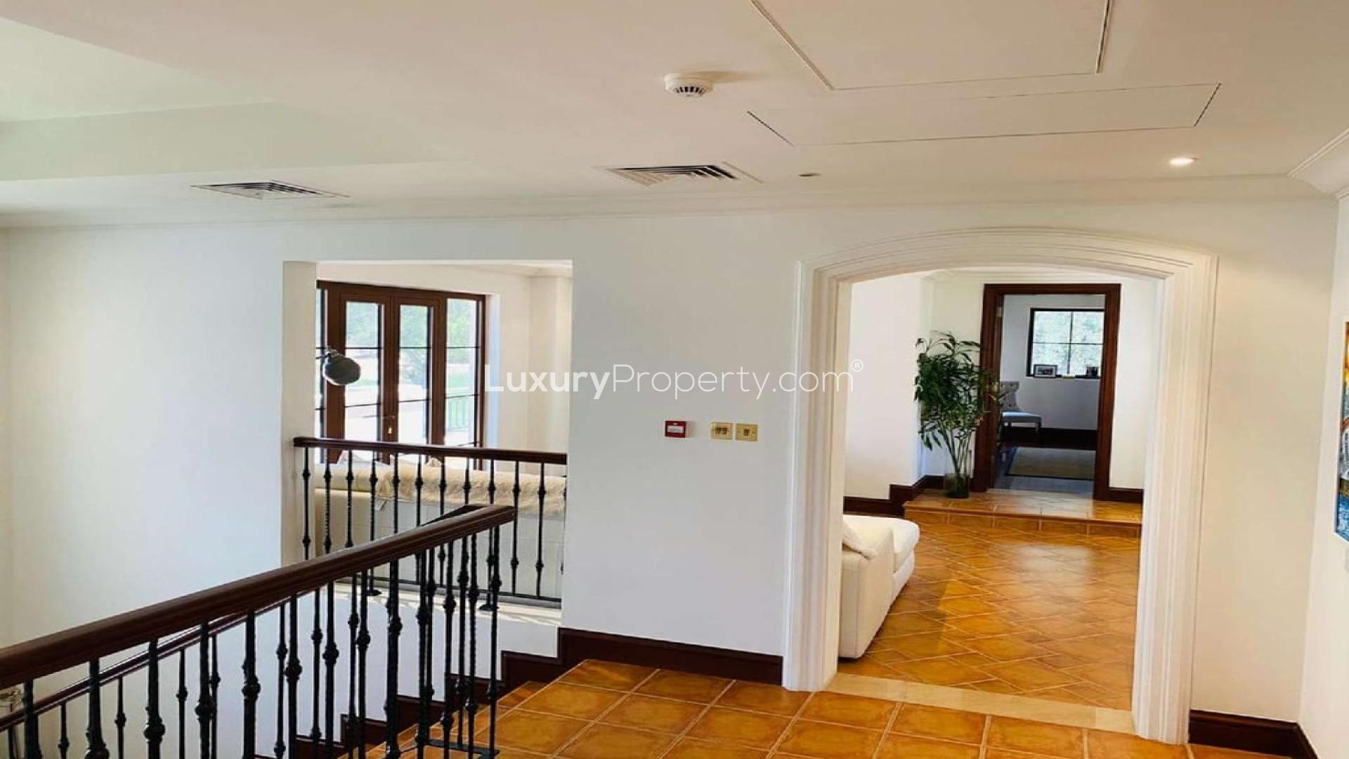 Zaragoza Villa exterior with garden, located in Jumeirah Golf Estates, Earth community