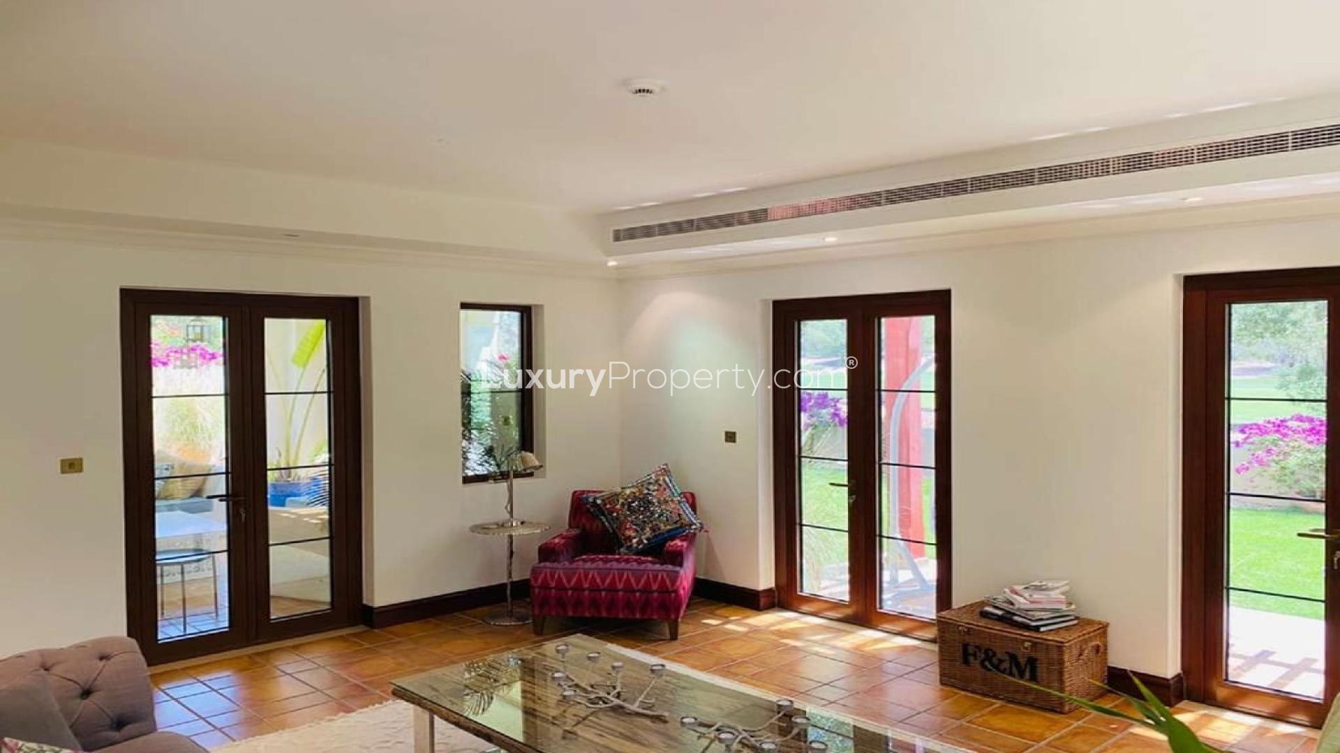 Zaragoza Villa exterior in Jumeirah Golf Estates, Earth community, with lush landscaping