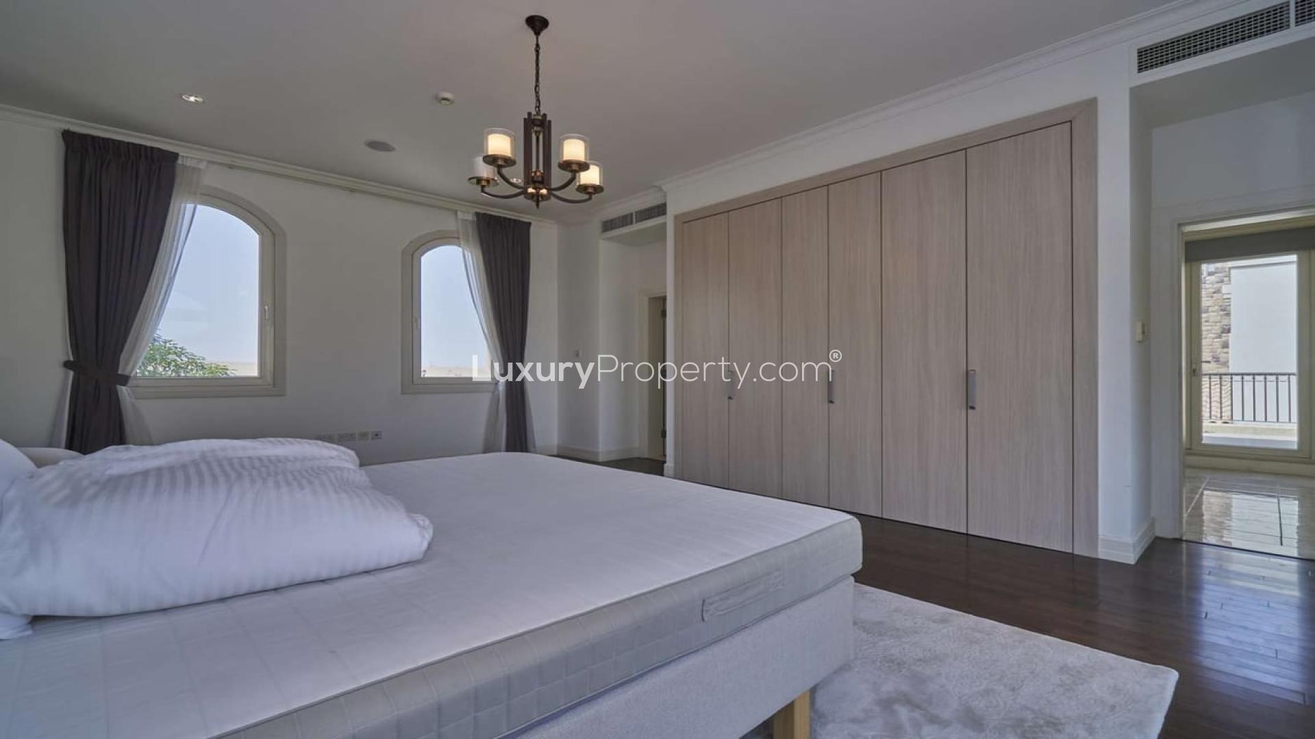 Fully furnished villa exterior in Sienna Lakes, Jumeirah Golf Estates, available for rent