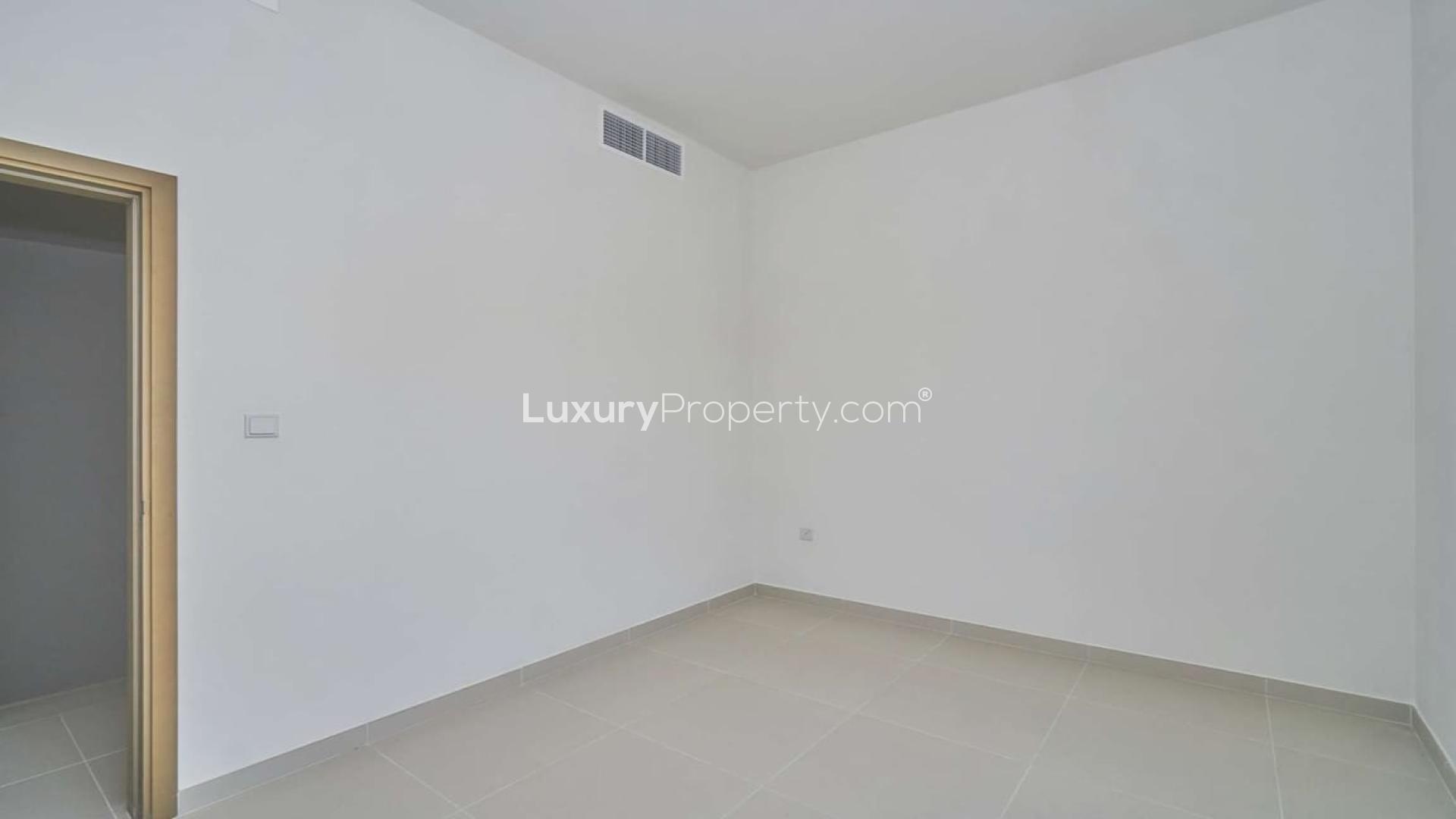 Modern villa interior with staircase and large windows in Villanova, Dubai Land