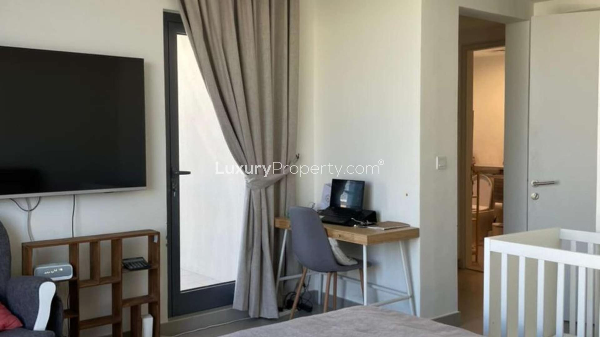 Living room with large windows in 4-bedroom townhouse, Maple at Dubai Hills Estate