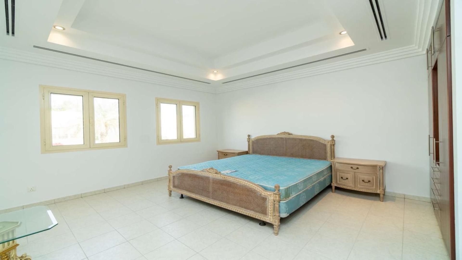 Lake view with vibrant garden path in Meadows 7 villa community for rent