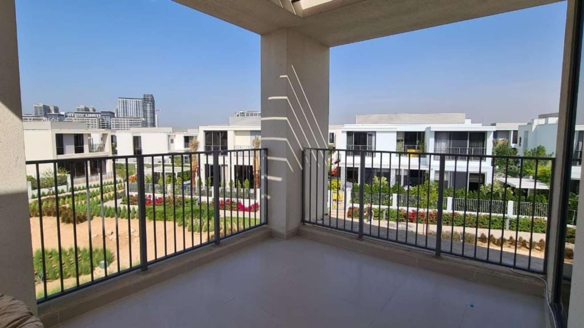 Modern villas in Sidra, Dubai Hills Estate, surrounded by lush greenery and landscaped paths