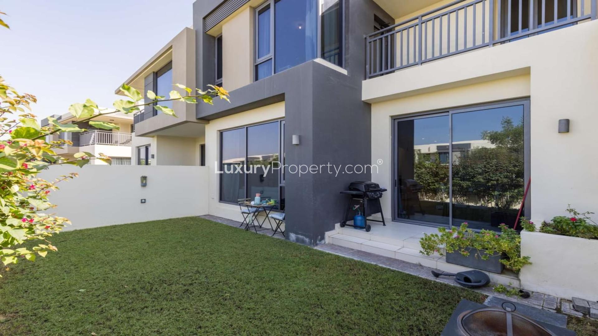 Exterior view of 4-bedroom villa in Maple, Dubai Hills Estate with garden area