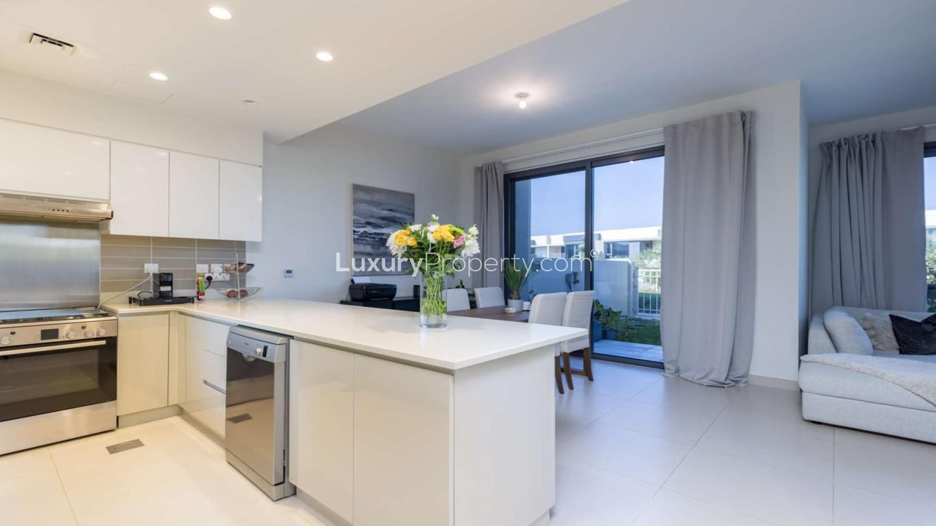 Exterior view of villa with garden in Maple, Dubai Hills Estate, available for rent