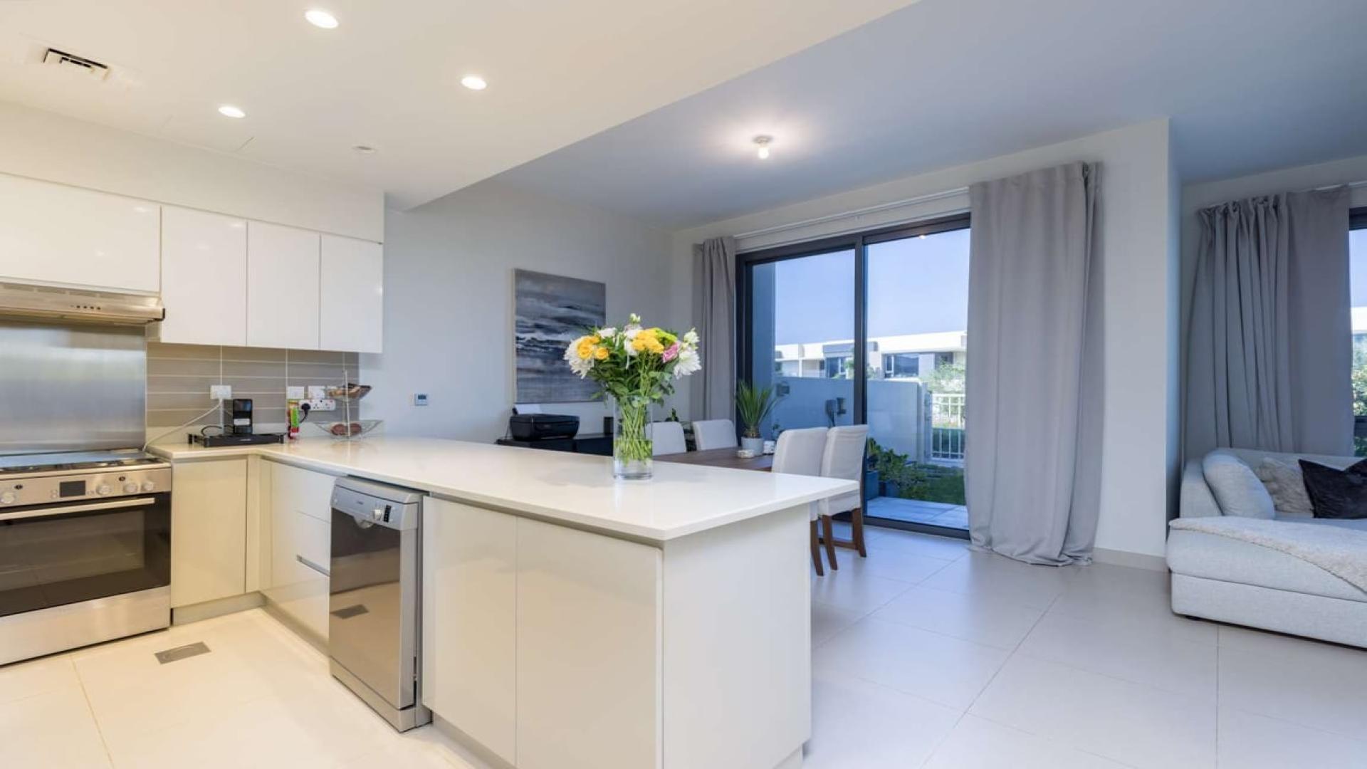 Exterior view of villa with garden in Maple, Dubai Hills Estate, available for rent