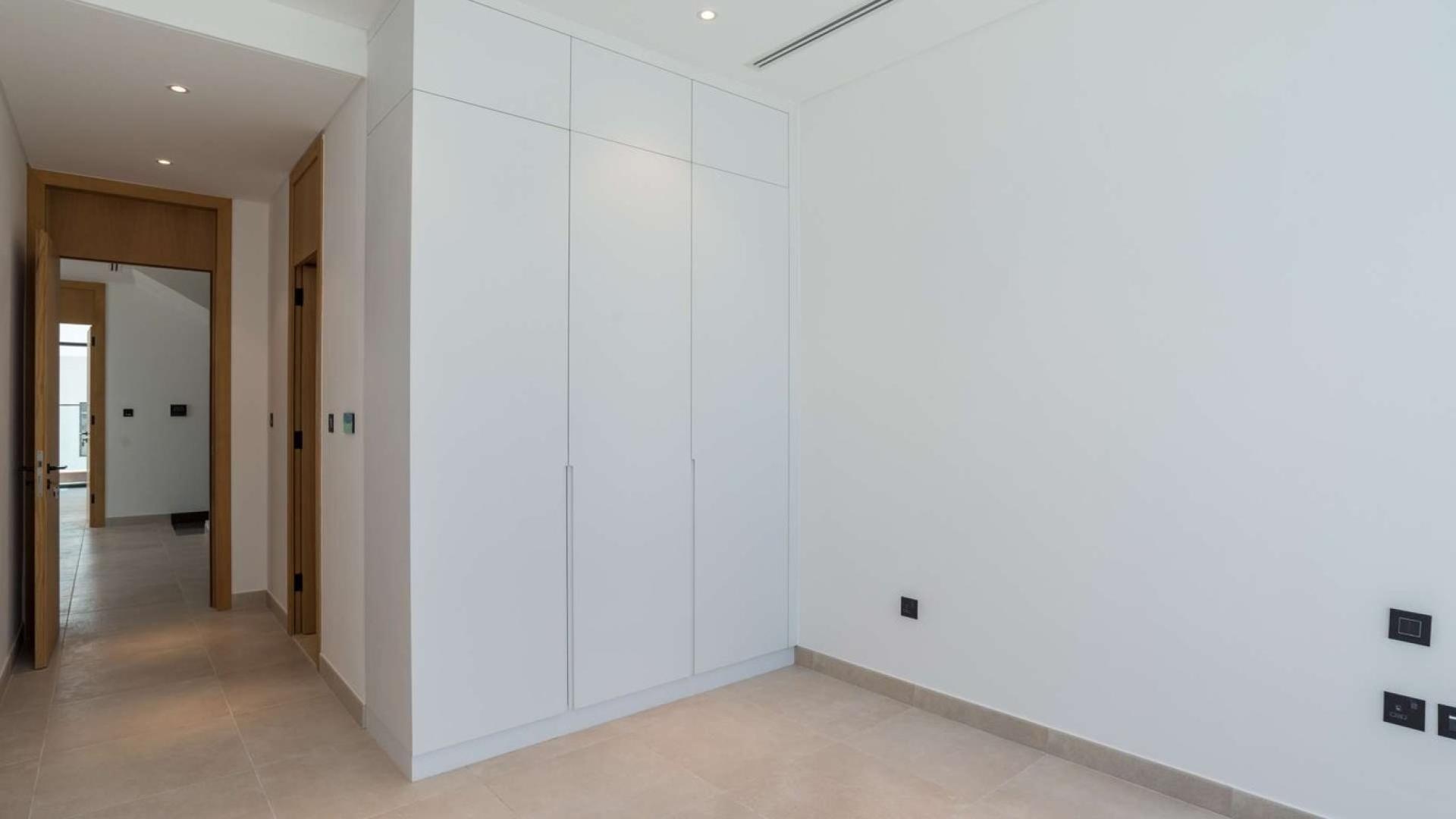 Corner villa interior with garden view, Jumeirah Golf Estates, available for rent, 4 bedrooms