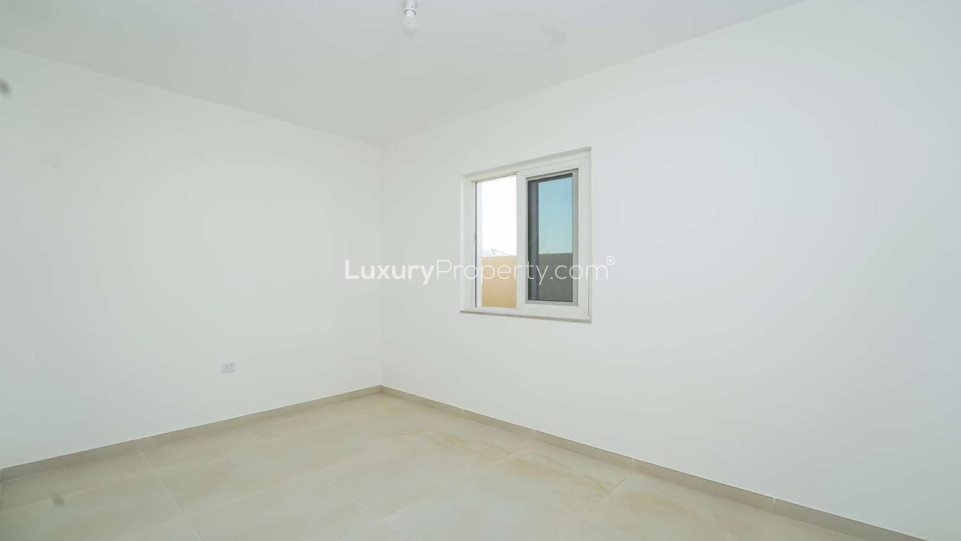 Spacious living area in upgraded four-bedroom villa, Victory Heights, Dubai Sports City