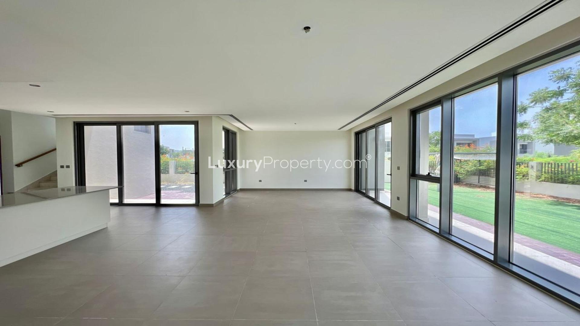 Spacious living area with large windows in Sidra II villa, Dubai Hills Estate