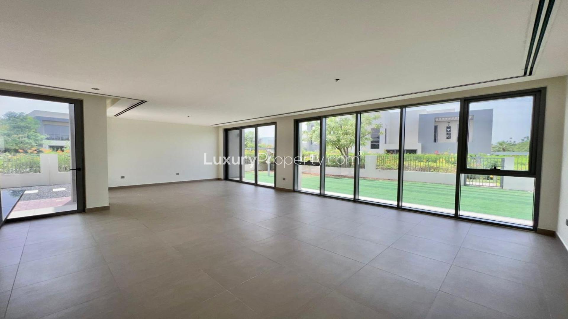 Spacious living room with large windows in Sidra II villa, Dubai Hills Estate