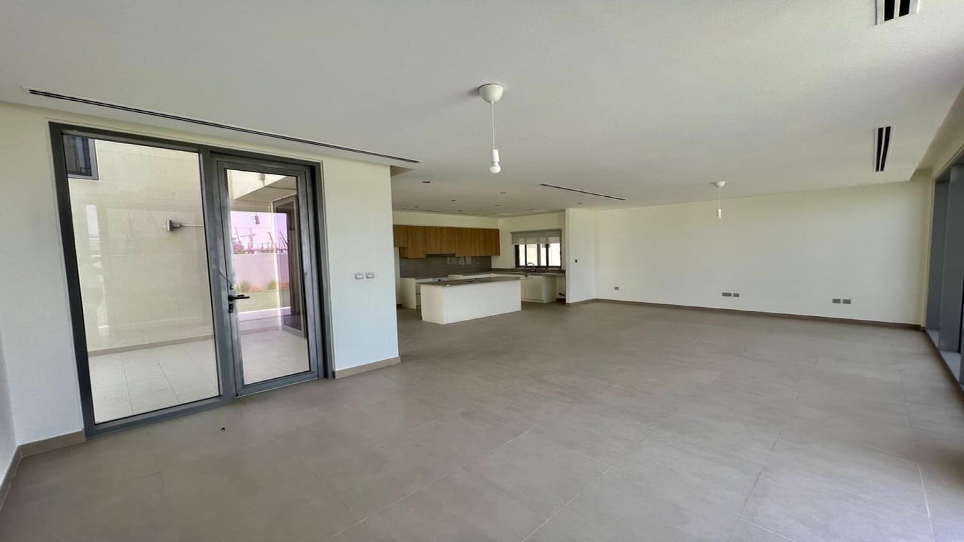 Spacious open-plan kitchen and living area in luxury Dubai Hills Estate villa for rent