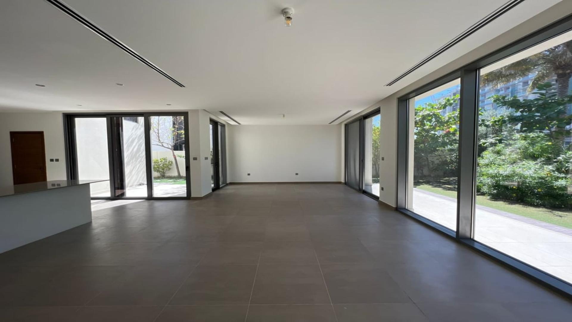 Spacious living area with garden view in Sidra Villas, Dubai Hills Estate villa for rent