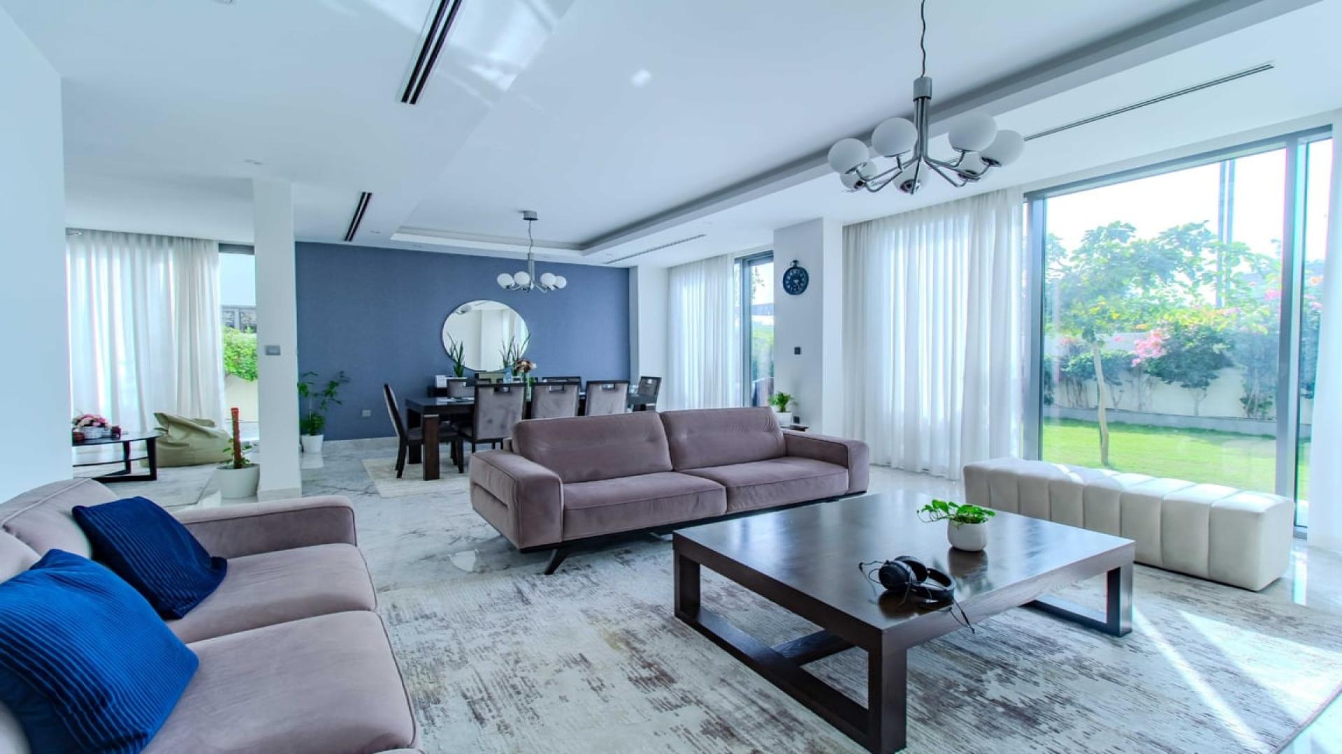 Upgraded 4-bedroom villa exterior with garden in Sidra, Dubai Hills Estate