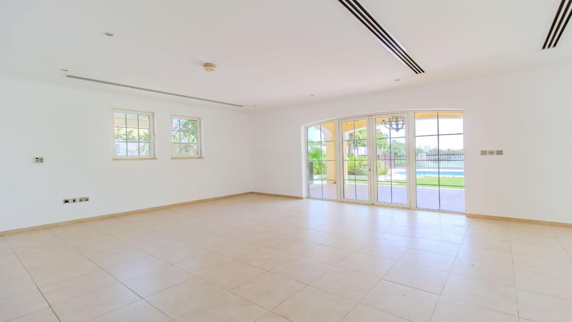Spacious unfurnished villa living room with large windows, Jumeirah Park Legacy, for rent