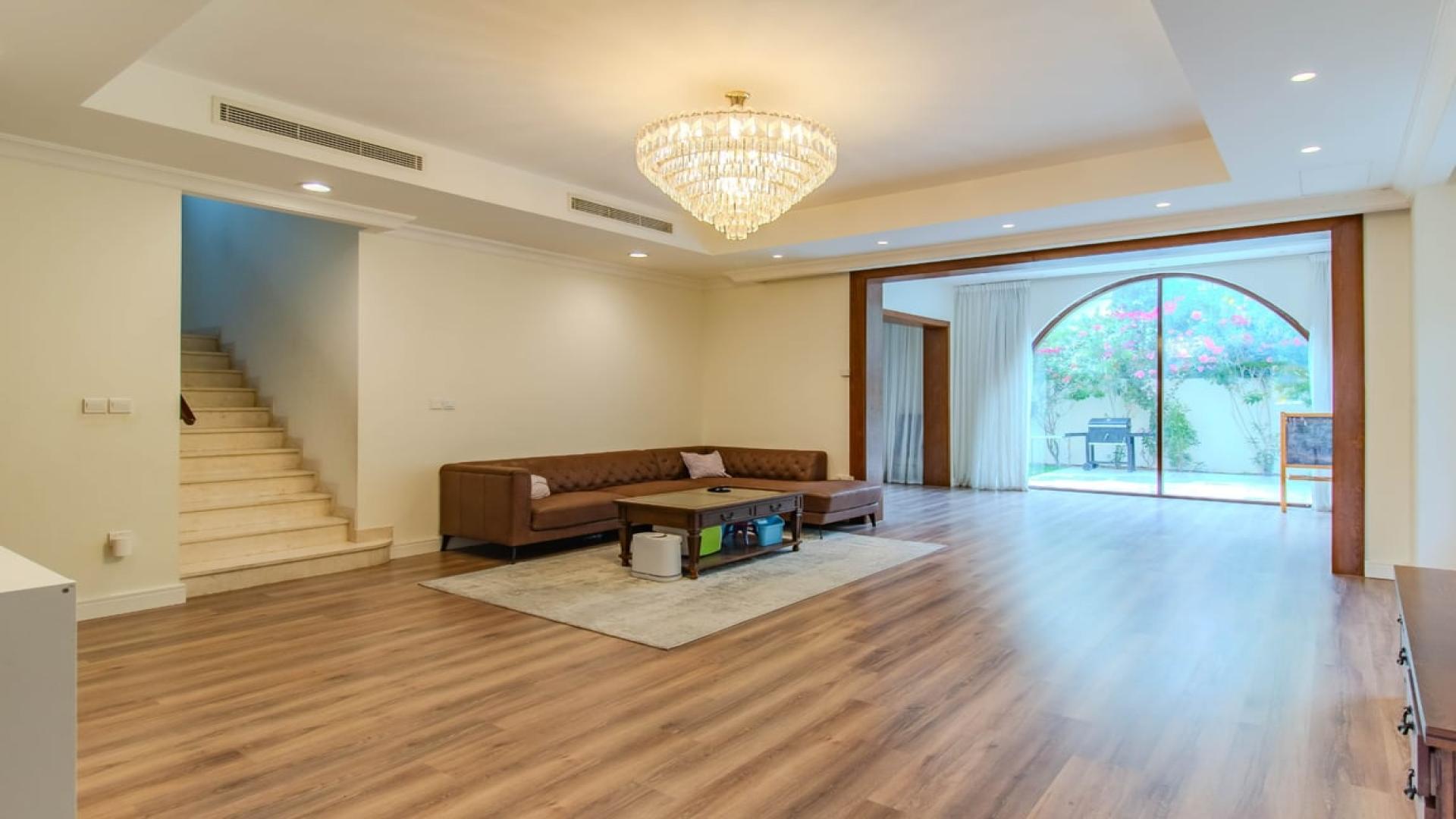 Exterior view of 4-bedroom villa in Palma, Arabian Ranches 2, with lush garden