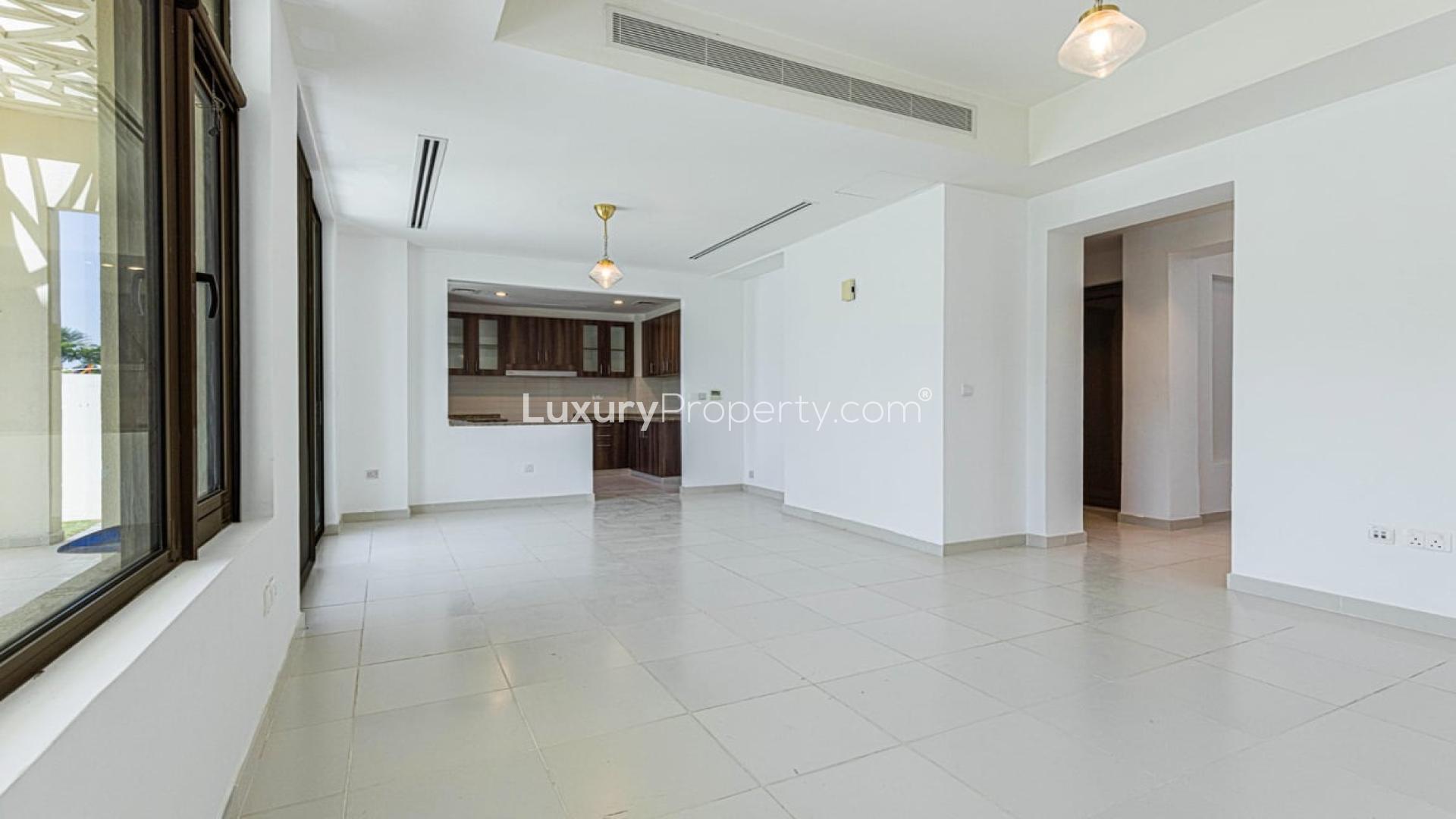 Bright living area with garden view in Mira Oasis villa, Reem community, Dubai