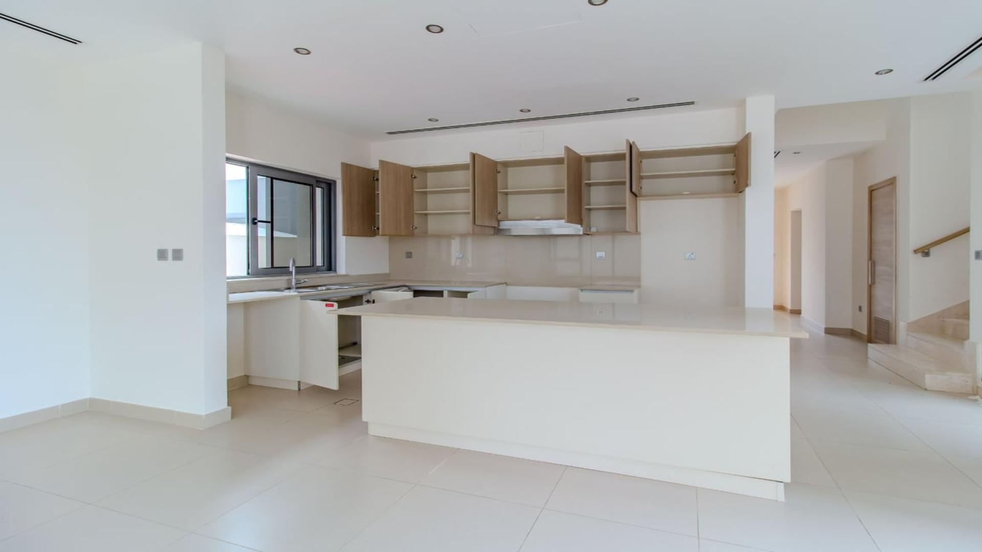 Open-plan living area and kitchen in Sidra Villas, Dubai Hills Estate