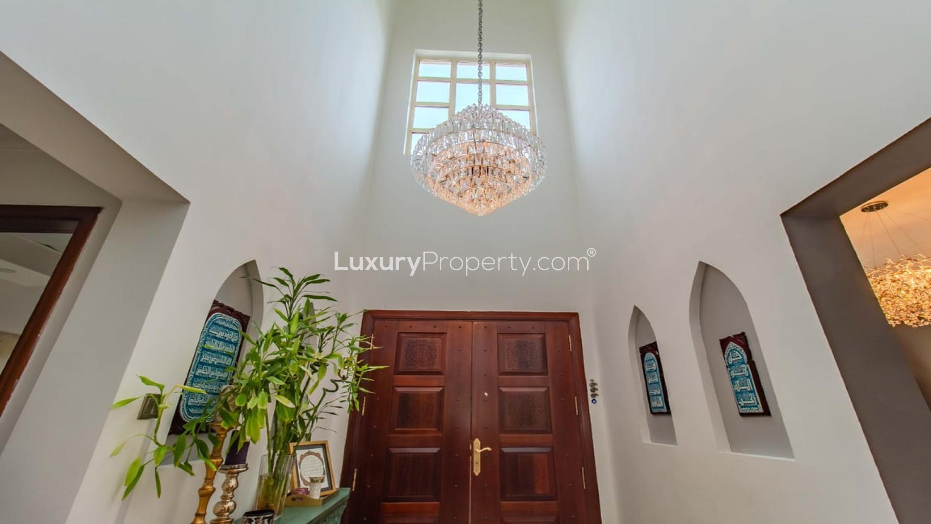 Renovated villa entrance with elegant staircase and decor in Jumeirah Islands, Islamic Clusters