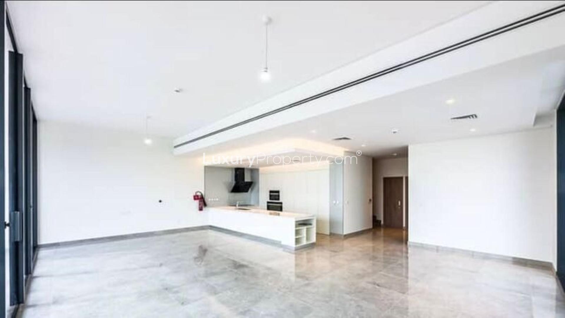 Exterior of modern villa with large glass windows in District One, Mohammed Bin Rashid City