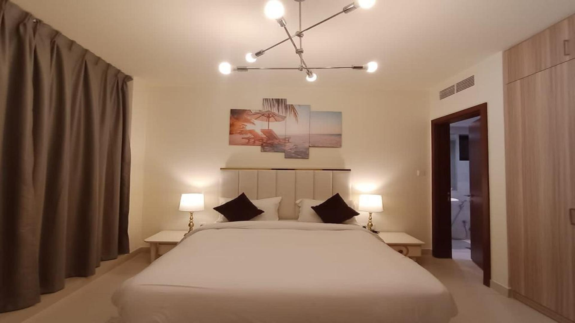 "Elegant dining area in fully furnished villa, Mohammed Bin Rashid City, District 11 rental.",Luxurious bedroom in fully furnished villa, District 11, Mohammed Bin Rashid City, for rent