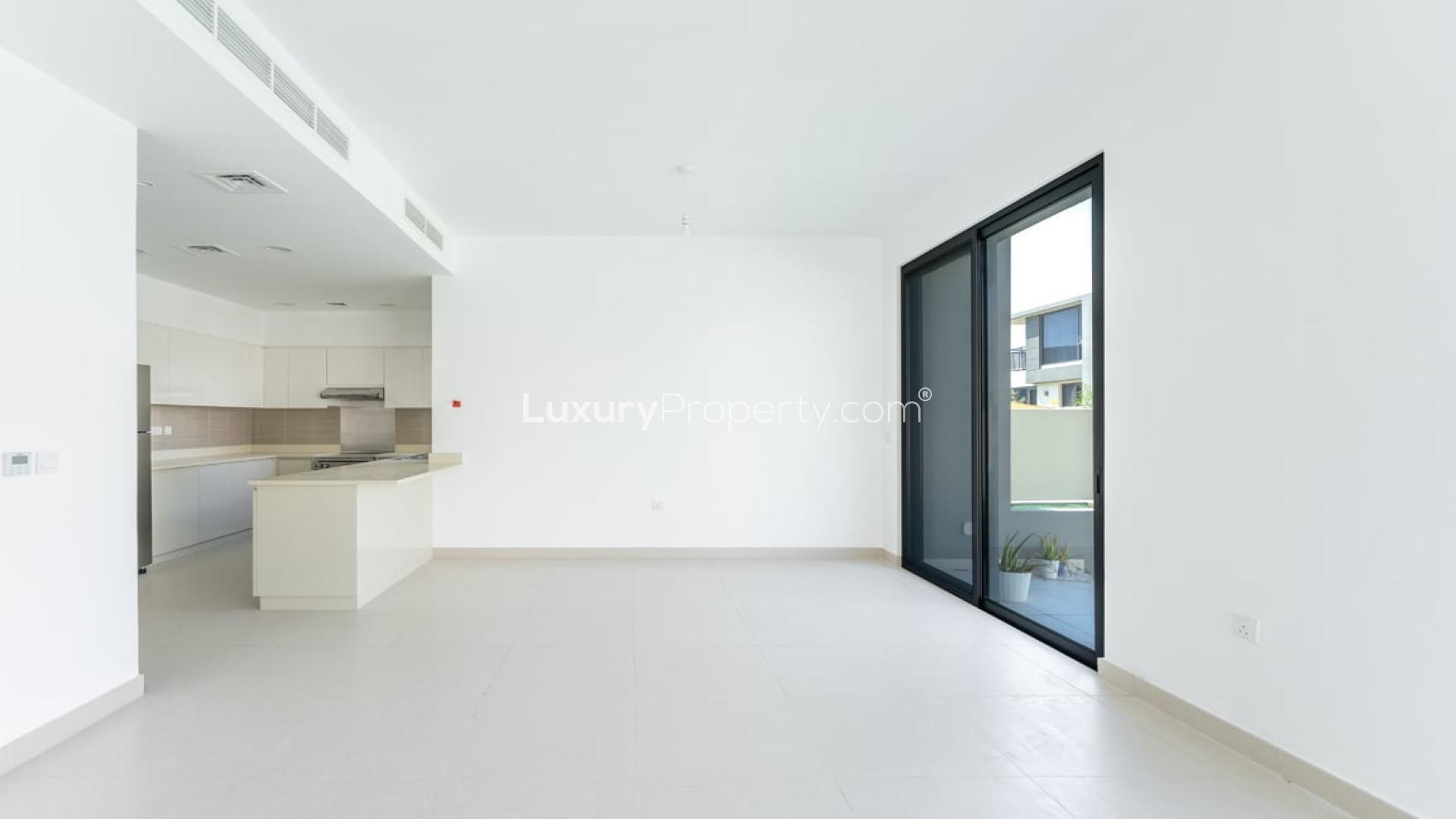 Bright living room with large windows in Maple villa, Dubai Hills Estate, available for rent