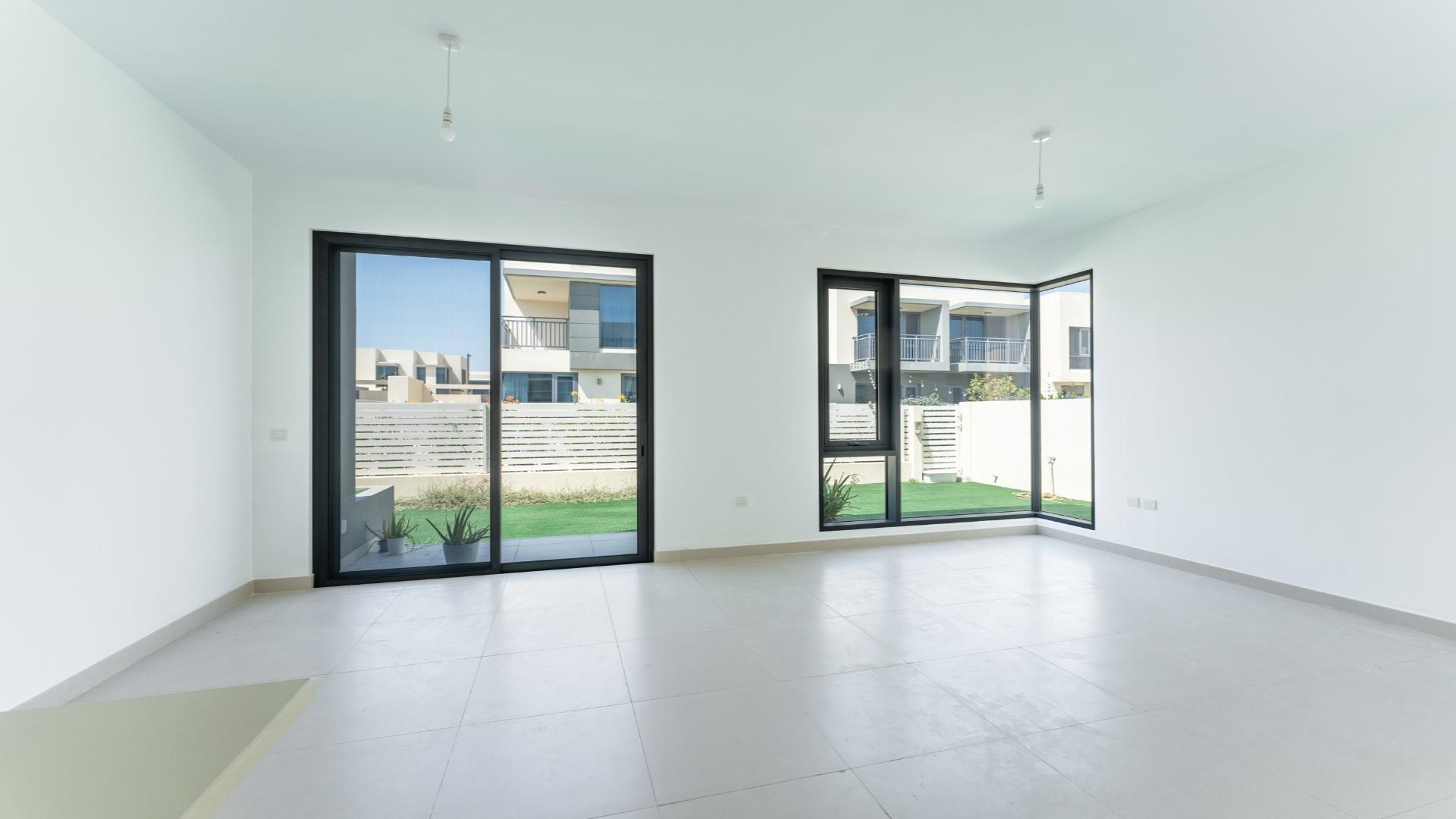 Bright living area with large windows in Dubai Hills Estate villa, Maple sub-community