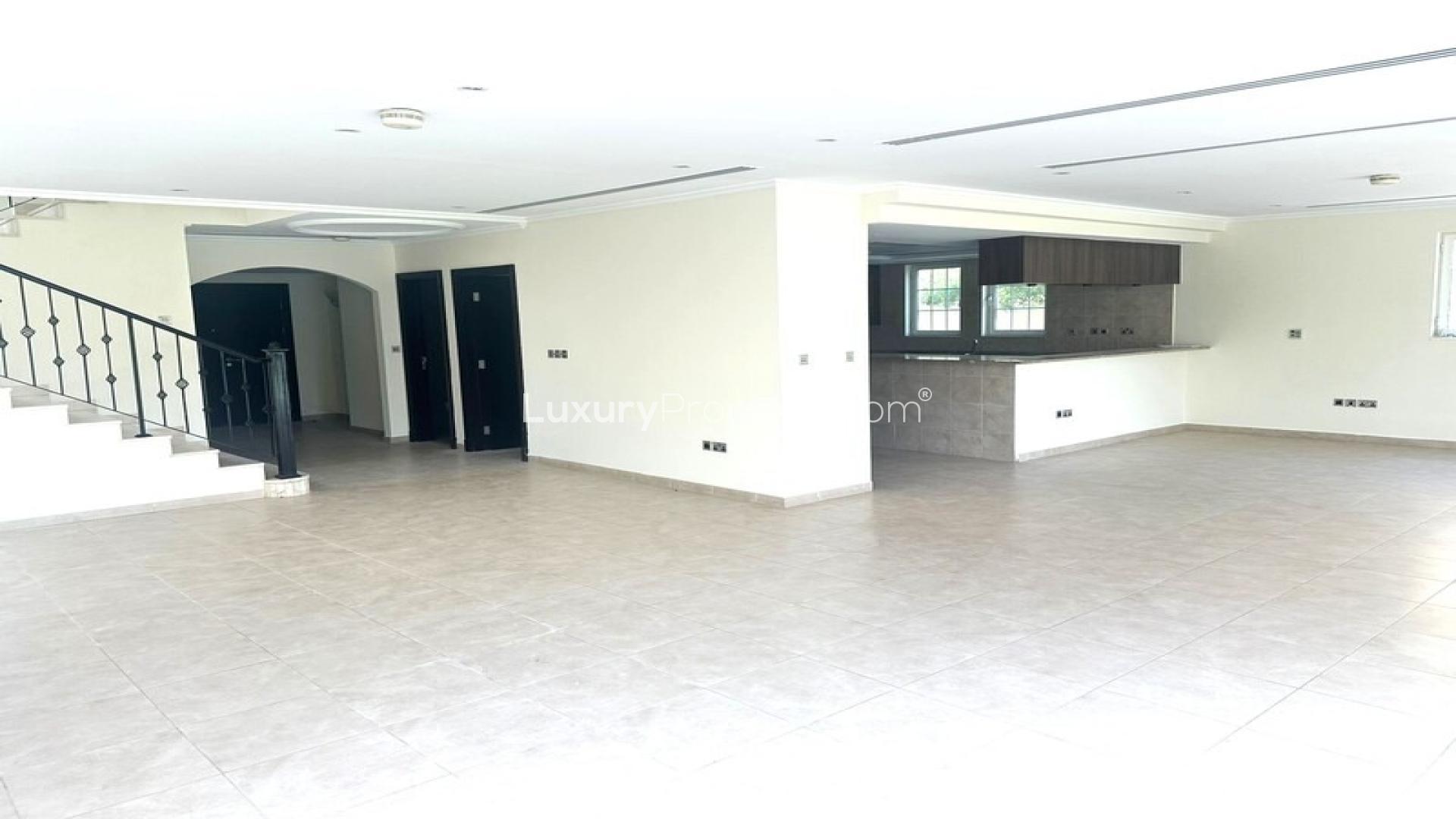Spacious living area with staircase in 4-bedroom villa, Jumeirah Park, Legacy community