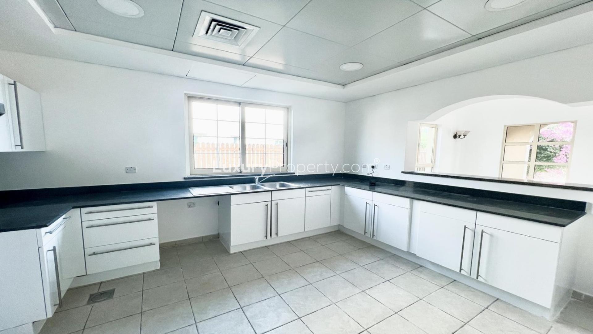 Luxurious Jumeirah Islands villa interior with elegant balcony and high ceiling chandelier