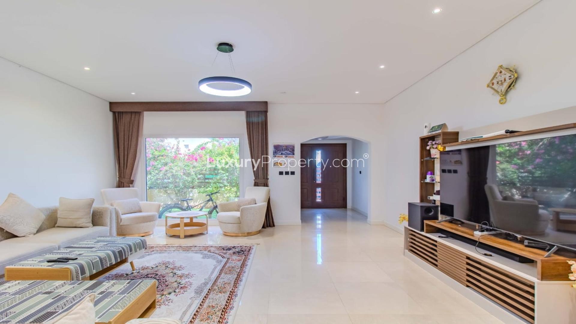 Luxurious living room in 4-bedroom villa, Meadows 9, Dubai, with modern decor and spacious layout