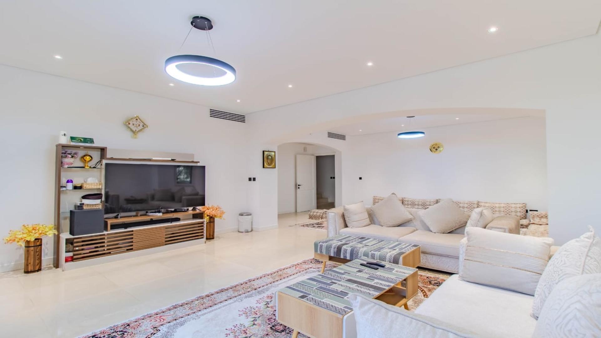 Luxurious living room in 4-bedroom villa, Meadows 9, Dubai, with elegant furnishings