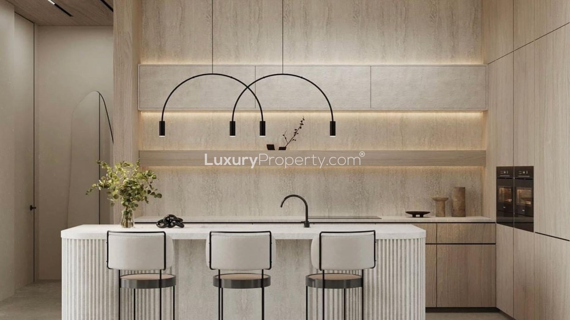 Modern living room in Jumeirah Islands villa with elegant decor and large windows