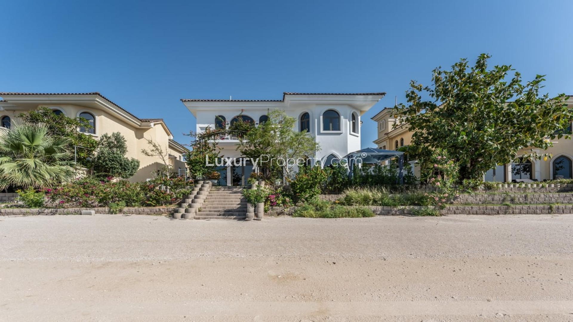 Luxurious Palm Jumeirah villa pool area with sea view, Garden Homes community