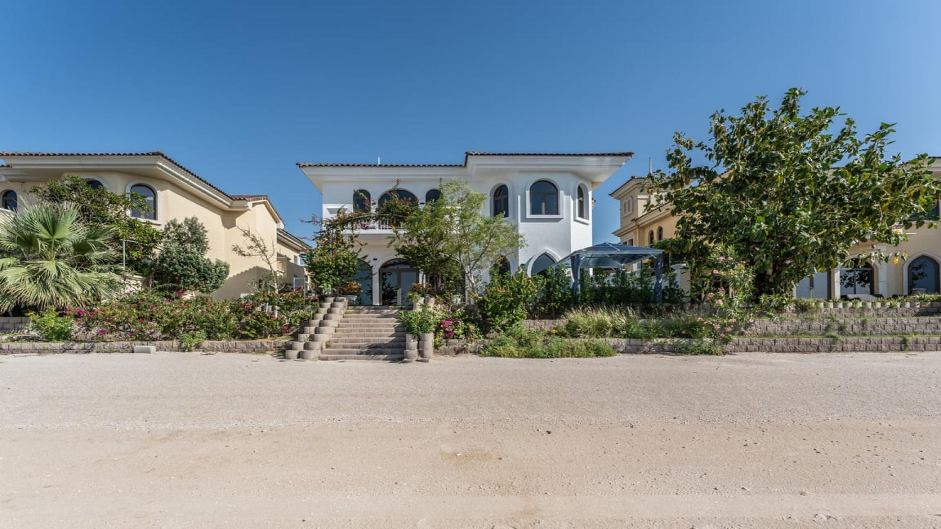 Luxurious Palm Jumeirah villa pool area with sea view, Garden Homes community