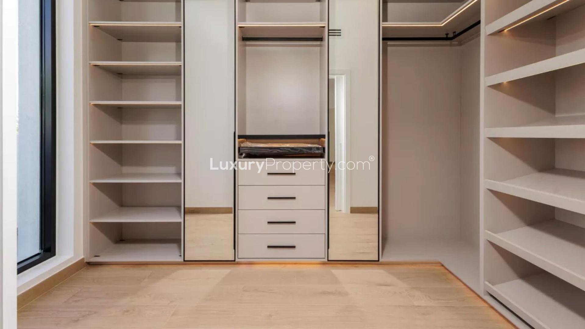 Luxurious bedroom with marble accents in European Clusters villa, Jumeirah Islands