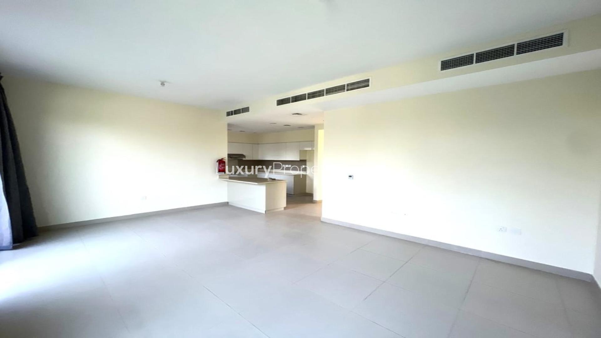 Spacious living room with garden view in Dubai Hills Estate villa for rent