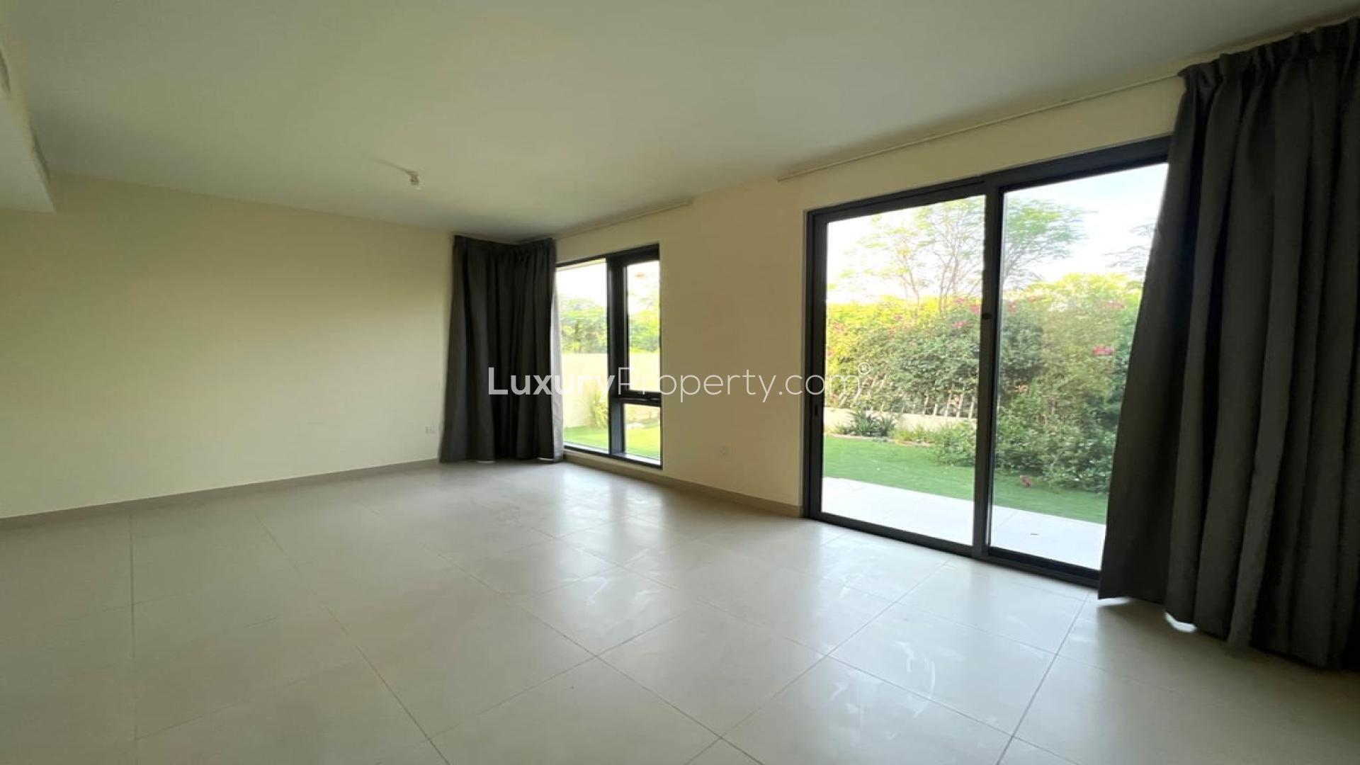 Four-bed villa exterior in Maple at Dubai Hills Estate, lush garden view