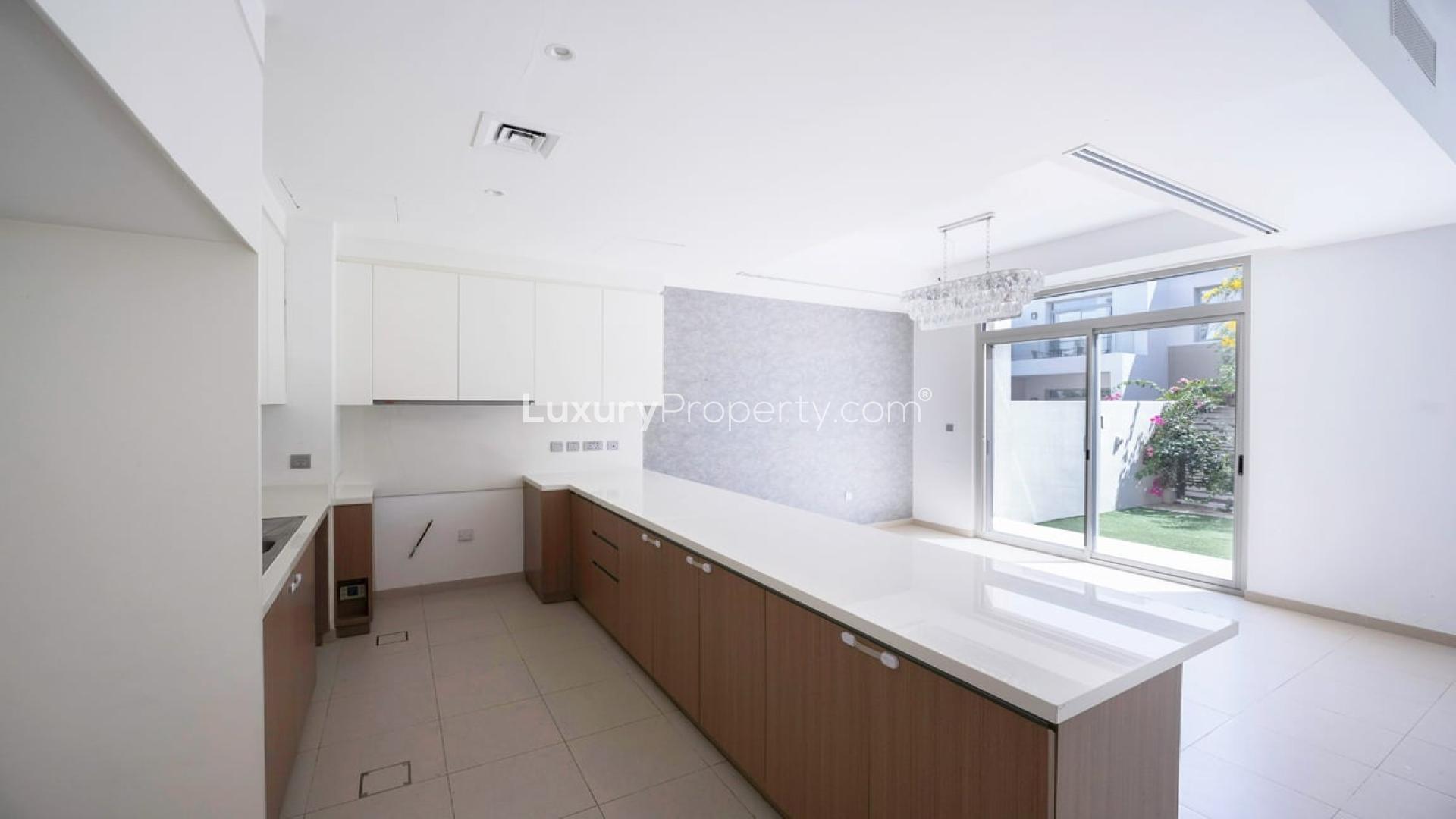 Modern kitchen in 4-bedroom villa, Arabian Ranches 2, Reem Community, available for rent