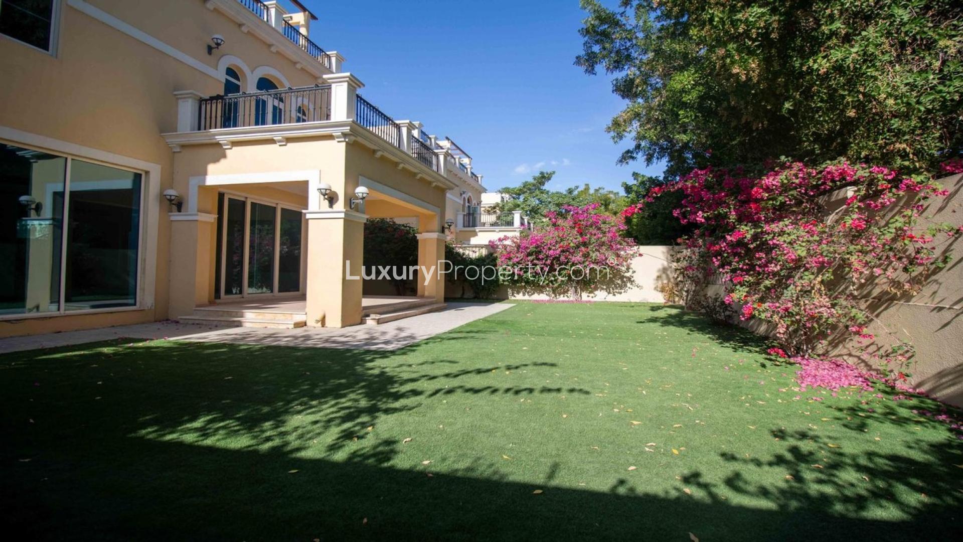 Serene villa with lush greenery and spacious lawn in Jumeirah Park's Legacy Nova Villas