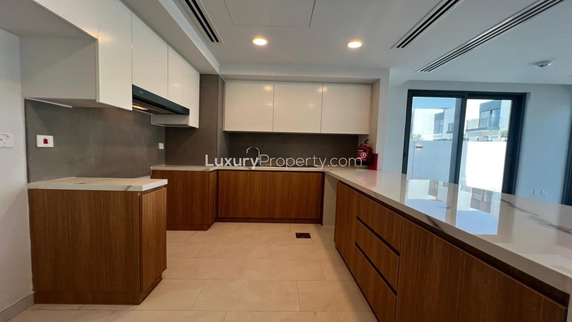 Modern kitchen in brand new 4-bedroom villa, Villanova, Dubai Land, for rent June 1st