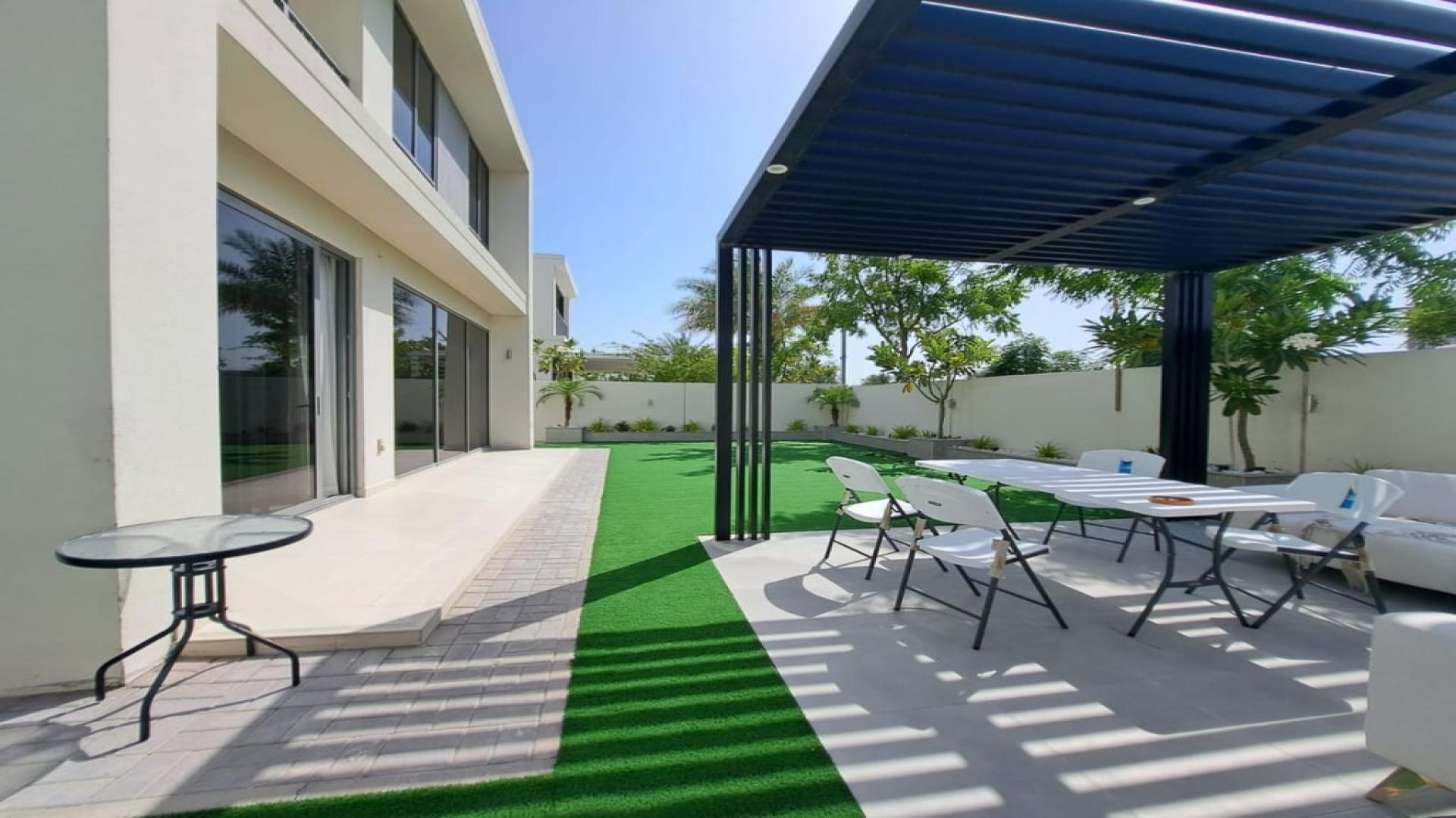 Modern kitchen in Sidra Villas, Dubai Hills Estate, featuring sleek design and ample space