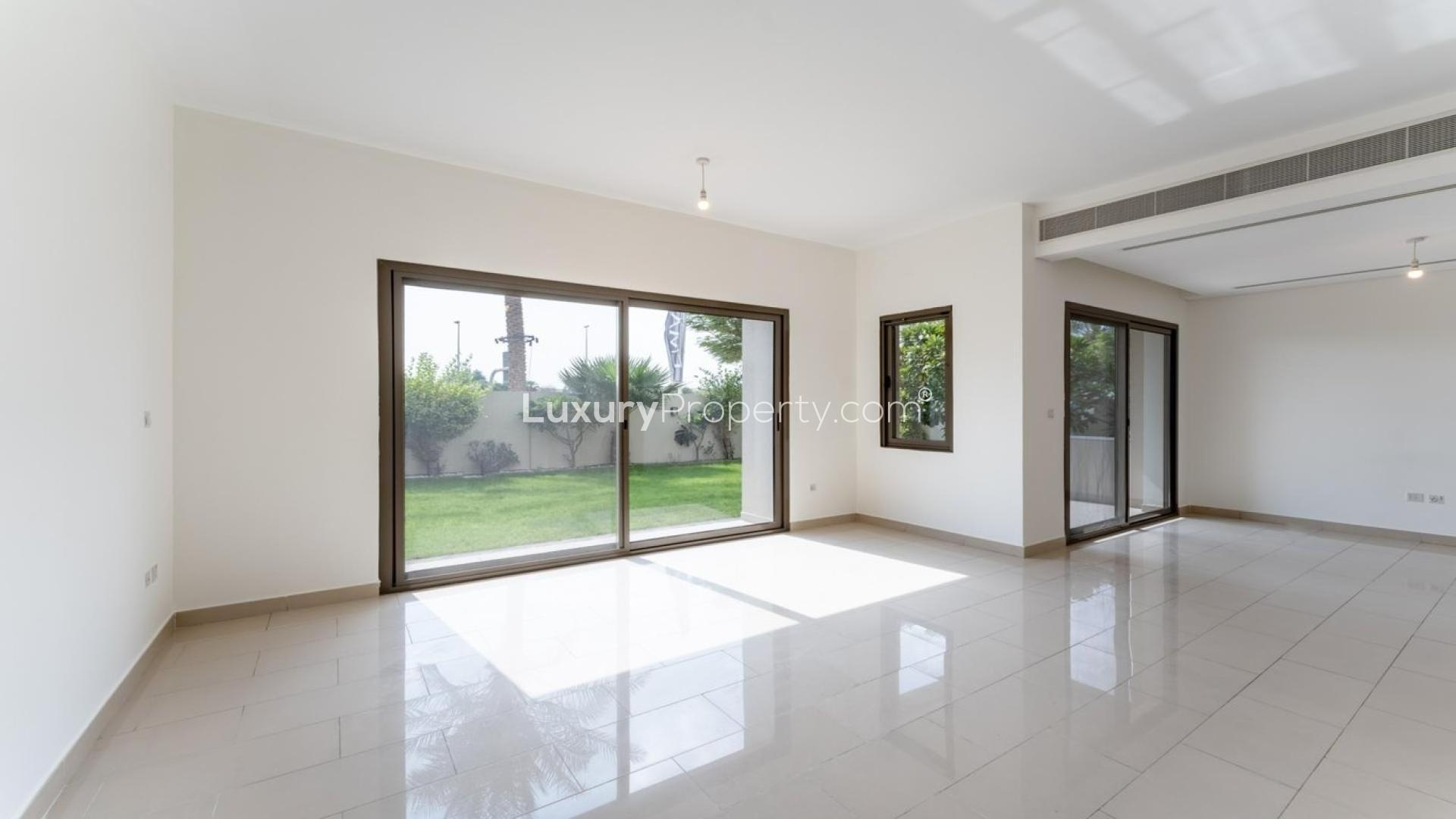 Bright living room with garden view in Azalea villa, Arabian Ranches 2